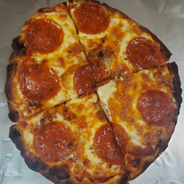 naan bread pizza, perfectly cooked and charred