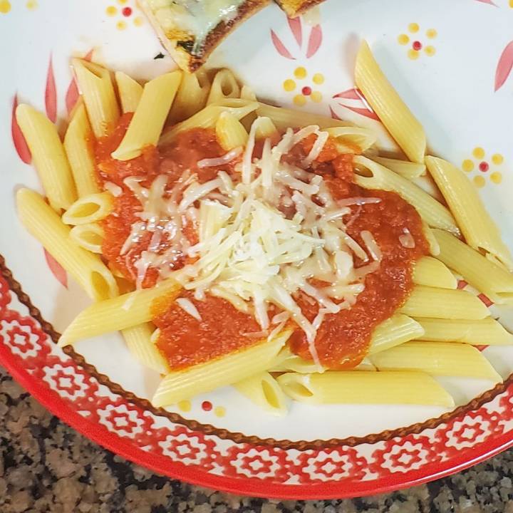 twinethyme simple homemade 5 ingredient pasta sauce red pasta sauce on ziti noodles with shredded parmesan cheese on top melting